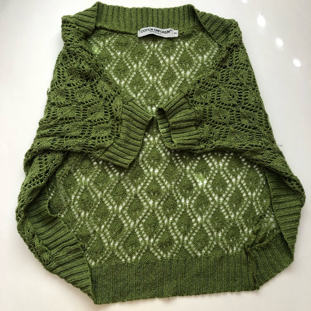 green shirt sleeved cardigan